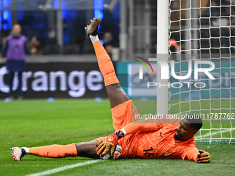 Mike Maignan of France participates in the Group A2 - UEFA Nations League 2024 match between Italy and France at Giuseppe Meazza San Siro St...