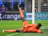 Mike Maignan of France participates in the Group A2 - UEFA Nations League 2024 match between Italy and France at Giuseppe Meazza San Siro St...