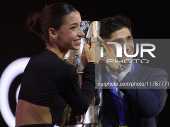 Jorge Martin (89) of Spain and Prima Pramac Racing Ducati with his girlfriend Maria Monfort with the trophy of MotoGP Champion during the Mo...