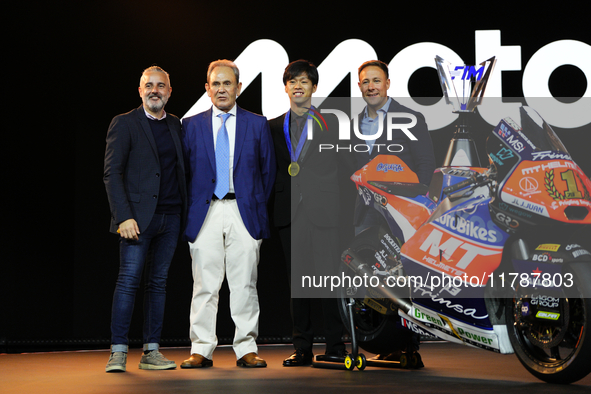 Ai Ogura (C) of Japan and Mt Helmets - Msi Boscoscuro during the MotoGP Awards after race of the Motul Solidarity Grand Prix of Barcelona at...