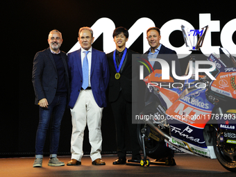 Ai Ogura (C) of Japan and Mt Helmets - Msi Boscoscuro during the MotoGP Awards after race of the Motul Solidarity Grand Prix of Barcelona at...