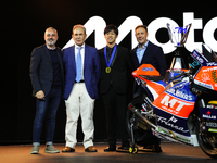 Ai Ogura (C) of Japan and Mt Helmets - Msi Boscoscuro during the MotoGP Awards after race of the Motul Solidarity Grand Prix of Barcelona at...