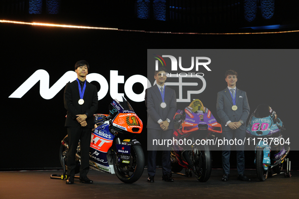 Ai Ogura (L) of Japan and Moto2 champion, Jorge Martin (89) of Spain and MotoGP Champion and David Alonso (80) of Colombia and Moto3 Champio...