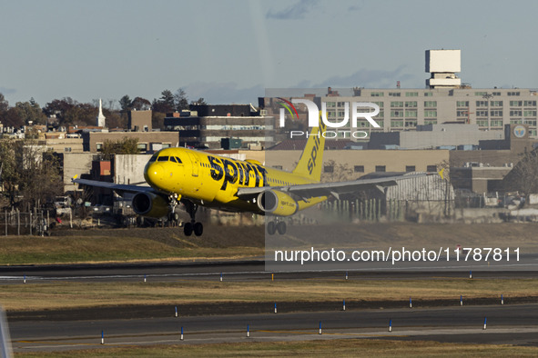 Spirit Airlines Airbus A320 aircraft spotted flying, landing and taxiing in LaGuardia airport. The iconic yellow A320-200 passenger airplane...