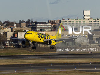 Spirit Airlines Airbus A320 aircraft spotted flying, landing and taxiing in LaGuardia airport. The iconic yellow A320-200 passenger airplane...