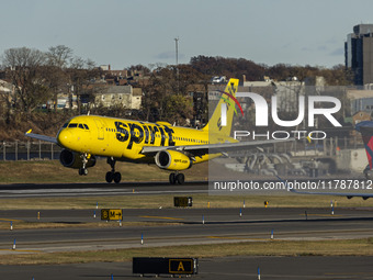 Spirit Airlines Airbus A320 aircraft spotted flying, landing and taxiing in LaGuardia airport. The iconic yellow A320-200 passenger airplane...