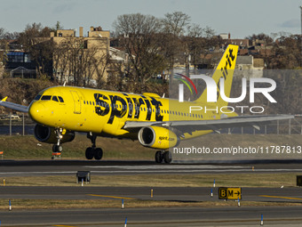 Spirit Airlines Airbus A320 aircraft spotted flying, landing and taxiing in LaGuardia airport. The iconic yellow A320-200 passenger airplane...