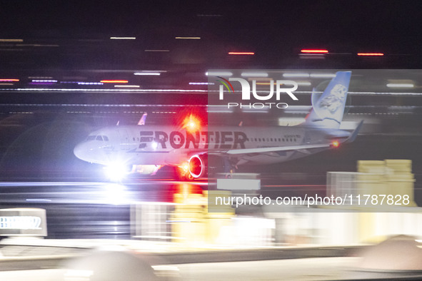 Frontier Airlines Airbus A320neo passenger aircraft spotted on accelerating on the runway for take off at Ronald Reagan Washington National...