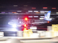 Frontier Airlines Airbus A320neo passenger aircraft spotted on accelerating on the runway for take off at Ronald Reagan Washington National...