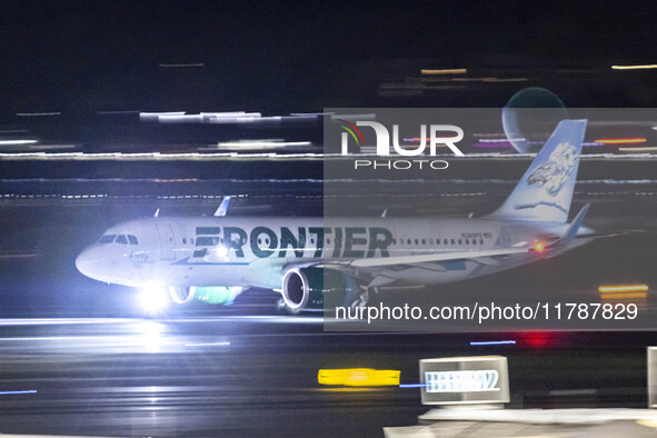 Frontier Airlines Airbus A320neo passenger aircraft spotted on accelerating on the runway for take off at Ronald Reagan Washington National...