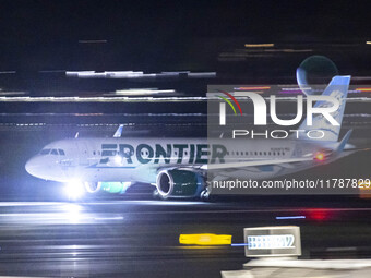 Frontier Airlines Airbus A320neo passenger aircraft spotted on accelerating on the runway for take off at Ronald Reagan Washington National...