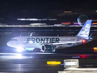 Frontier Airlines Airbus A320neo passenger aircraft spotted on accelerating on the runway for take off at Ronald Reagan Washington National...