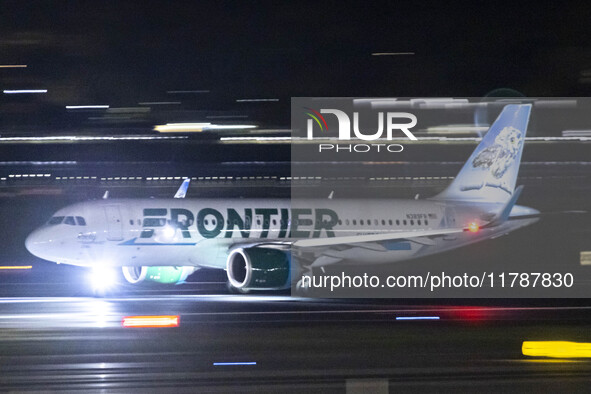 Frontier Airlines Airbus A320neo passenger aircraft spotted on accelerating on the runway for take off at Ronald Reagan Washington National...