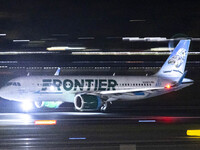 Frontier Airlines Airbus A320neo passenger aircraft spotted on accelerating on the runway for take off at Ronald Reagan Washington National...