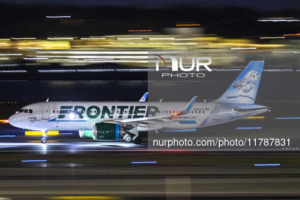 Frontier Airlines Airbus A320neo passenger aircraft spotted on accelerating on the runway for take off at Ronald Reagan Washington National...