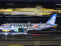 Frontier Airlines Airbus A320neo passenger aircraft spotted on accelerating on the runway for take off at Ronald Reagan Washington National...