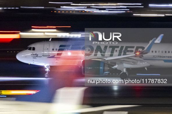 Frontier Airlines Airbus A320neo passenger aircraft spotted on accelerating on the runway for take off at Ronald Reagan Washington National...