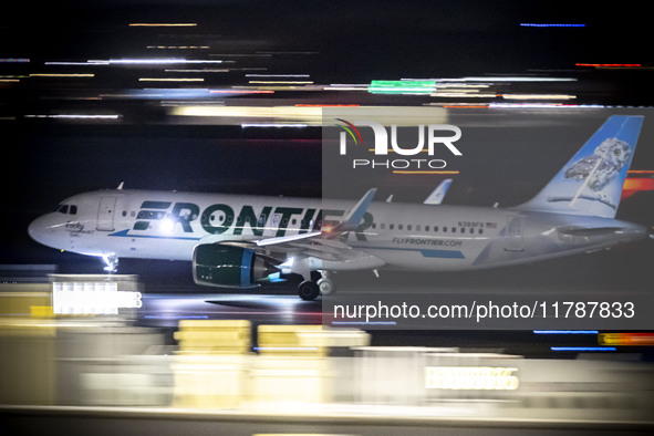 Frontier Airlines Airbus A320neo passenger aircraft spotted on accelerating on the runway for take off at Ronald Reagan Washington National...