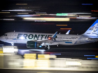 Frontier Airlines Airbus A320neo passenger aircraft spotted on accelerating on the runway for take off at Ronald Reagan Washington National...