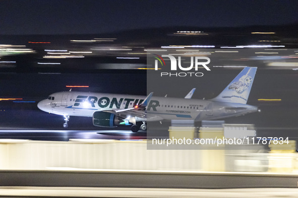 Frontier Airlines Airbus A320neo passenger aircraft spotted on accelerating on the runway for take off at Ronald Reagan Washington National...