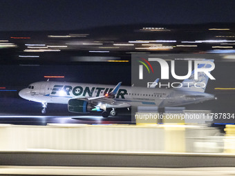 Frontier Airlines Airbus A320neo passenger aircraft spotted on accelerating on the runway for take off at Ronald Reagan Washington National...