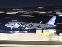 Frontier Airlines Airbus A320neo passenger aircraft spotted on accelerating on the runway for take off at Ronald Reagan Washington National...