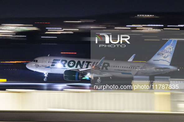 Frontier Airlines Airbus A320neo passenger aircraft spotted on accelerating on the runway for take off at Ronald Reagan Washington National...