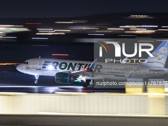 Frontier Airlines Airbus A320neo passenger aircraft spotted on accelerating on the runway for take off at Ronald Reagan Washington National...