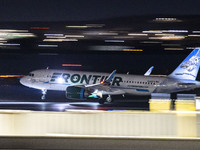 Frontier Airlines Airbus A320neo passenger aircraft spotted on accelerating on the runway for take off at Ronald Reagan Washington National...