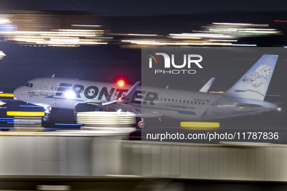 Frontier Airlines Airbus A320neo passenger aircraft spotted on accelerating on the runway for take off at Ronald Reagan Washington National...