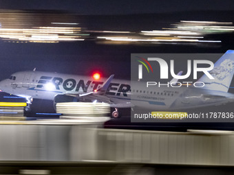 Frontier Airlines Airbus A320neo passenger aircraft spotted on accelerating on the runway for take off at Ronald Reagan Washington National...