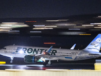 Frontier Airlines Airbus A320neo passenger aircraft spotted on accelerating on the runway for take off at Ronald Reagan Washington National...