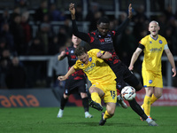 Manny Onariase of Hartlepool United battles for possession with Dominic Cape of Eastleigh during the Vanarama National League match between...