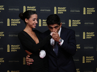 Jorge Martin of Spain and Prima Pramac Racing Ducati with his girlfriend Maria Monfort on the red carpet before the MotoGP Awards after the...