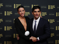 Jorge Martin of Spain and Prima Pramac Racing Ducati with his girlfriend Maria Monfort on the red carpet before the MotoGP Awards after the...