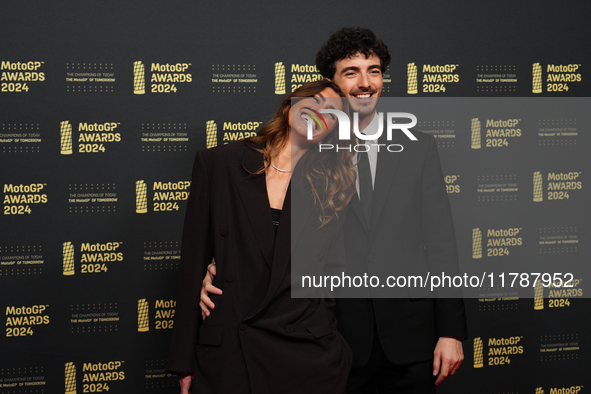 Francesco Pecco Bagnaia (1) of Italy and Ducati Lenovo Team with his wife Domizia Castagnini on the red carpet before the MotoGP Awards afte...