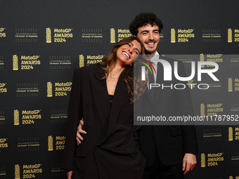 Francesco Pecco Bagnaia (1) of Italy and Ducati Lenovo Team with his wife Domizia Castagnini on the red carpet before the MotoGP Awards afte...