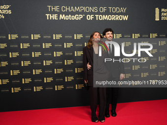 Francesco Pecco Bagnaia (1) of Italy and Ducati Lenovo Team with his wife Domizia Castagnini on the red carpet before the MotoGP Awards afte...