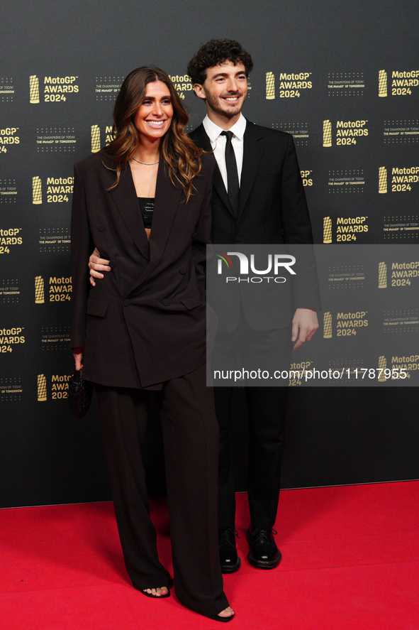 Francesco Pecco Bagnaia (1) of Italy and Ducati Lenovo Team with his wife Domizia Castagnini on the red carpet before the MotoGP Awards afte...