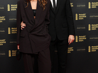 Francesco Pecco Bagnaia (1) of Italy and Ducati Lenovo Team with his wife Domizia Castagnini on the red carpet before the MotoGP Awards afte...