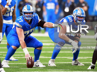 DETROIT,MICHIGAN-NOVEMBER17:  Center Frank Ragnow (77) of the Detroit Lions gestures before the snap during a game between the Detroit Lions...