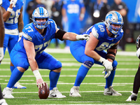 DETROIT,MICHIGAN-NOVEMBER17:  Center Frank Ragnow (77) of the Detroit Lions gestures before the snap during a game between the Detroit Lions...