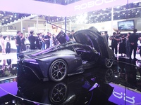 Visitors view the world's first AI-powered supercar, ROBO X, at the Guangzhou Auto Show in Guangzhou, China, on November 15, 2024. (