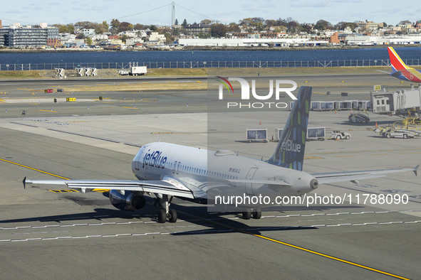 JetBlue Airbus A320-200 passenger aircraft spotted taxiing in LaGuardia airport LGA in New York City. The A320 airplane has the registration...