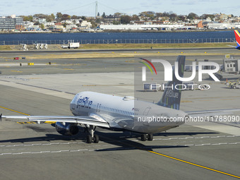 JetBlue Airbus A320-200 passenger aircraft spotted taxiing in LaGuardia airport LGA in New York City. The A320 airplane has the registration...