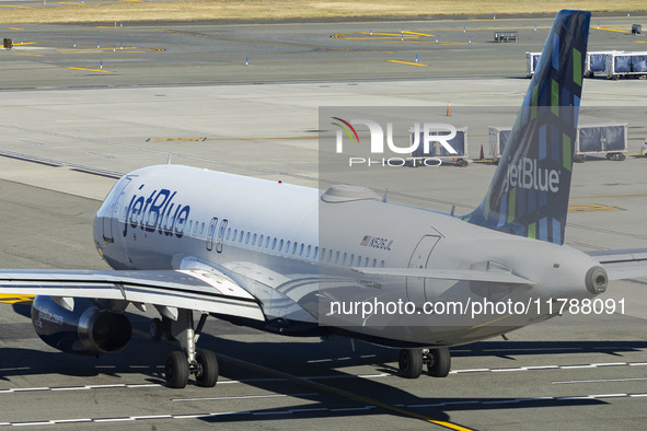 JetBlue Airbus A320-200 passenger aircraft spotted taxiing in LaGuardia airport LGA in New York City. The A320 airplane has the registration...