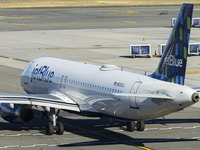 JetBlue Airbus A320-200 passenger aircraft spotted taxiing in LaGuardia airport LGA in New York City. The A320 airplane has the registration...