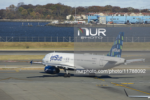 JetBlue Airbus A320-200 passenger aircraft spotted taxiing in LaGuardia airport LGA in New York City. The A320 airplane has the registration...