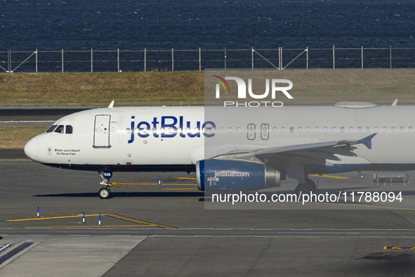 JetBlue Airbus A320-200 passenger aircraft spotted taxiing in LaGuardia airport LGA in New York City. The A320 airplane has the registration...