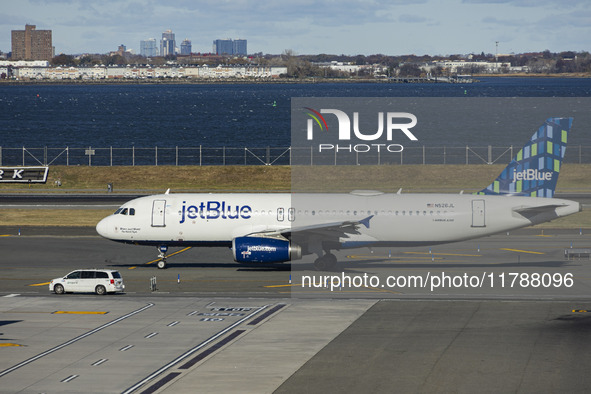 JetBlue Airbus A320-200 passenger aircraft spotted taxiing in LaGuardia airport LGA in New York City. The A320 airplane has the registration...